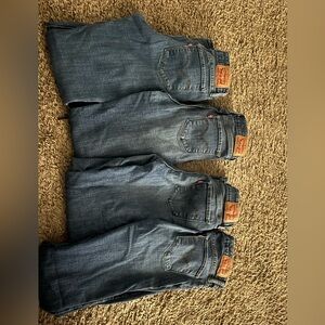FOUR pairs of Levi 711 skinny jeans